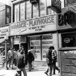 "1975: A porn shop with films and live shows near Times Square."